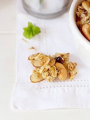 Golden baked granola cluster with cashews and slivered almonds.