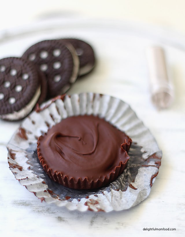 Chocolate covered gluten free cookies! Melted morsels and chocolate vanilla cream cookies dipped and chilled together for a delicious chocolate dessert treat!  #chocolate #glutenfree #cookies #creamcookies | Recipe at delightfulmomfood.com