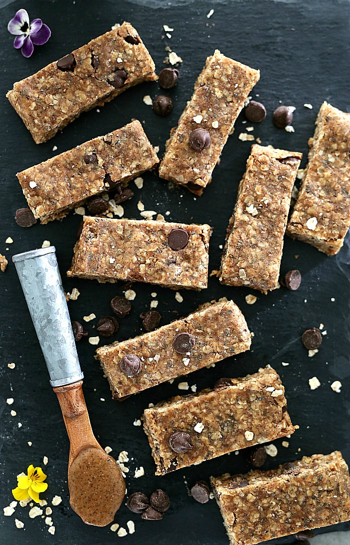 No-bake breakfast bars make the perfect on-the-go balanced meal for kids and adults! These incredibly easy homemade granola bars take little time to make and are made with wholesome oats, almond butter and no refined sugars. An addictive gluten free treat you will want to nibble on to energize all day long! #nobake #breakfast #bars #oats #easy #quick #healthy #glutenfree #breakfast #snack #wholesome #recipe | Recipe at delightfulmomfood.com