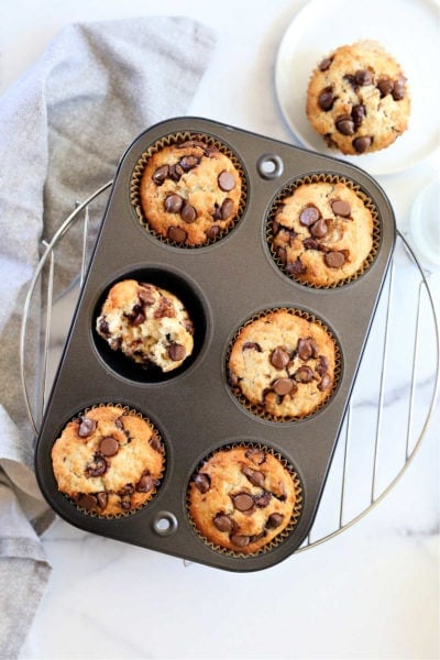 healthy chocolate chip muffins in a baking pan
