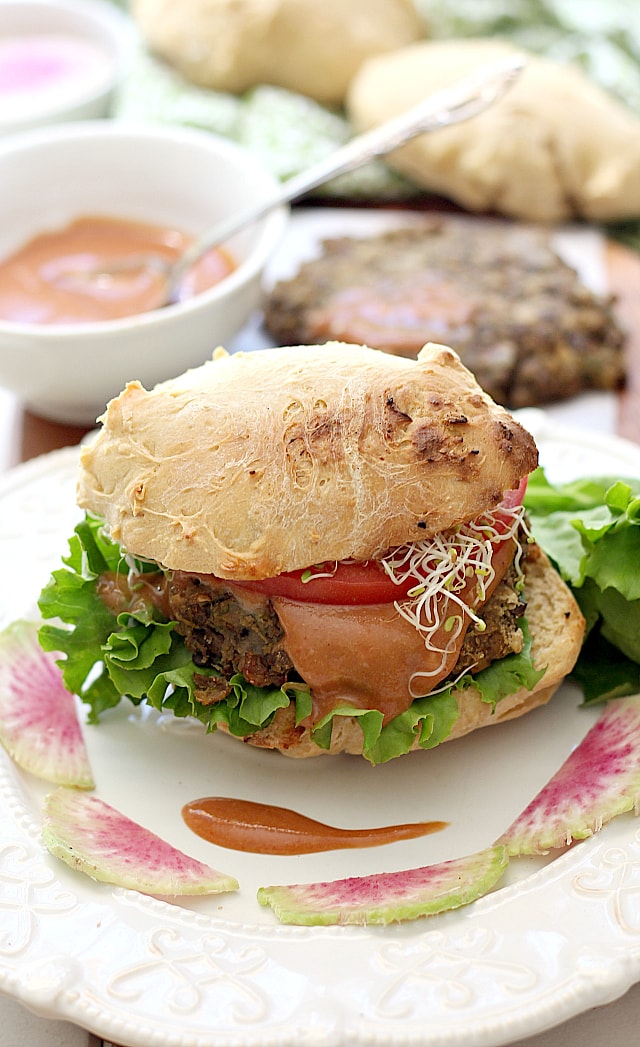 Juicy mouthwatering Veggie Burger made of cooked lentils and zucchini. A flavorful meat-like texture and gluten free patty! #grilled #veggie #burger #lentil #glutenfree #recipe | Delightful Mom Food