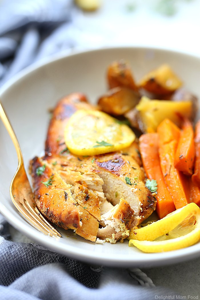 Zesty honey lemon chicken slowly cooked in the slow cooker frees up cooking space and valuable time! The chicken is infused with a marinade of turmeric, honey, lemon and oil creating a delicious meal with a slightly sweet side. #honey #lemon #chicken #recipe #glutenfree #healthy #crockpot #slowcooker | Delightful Mom Food