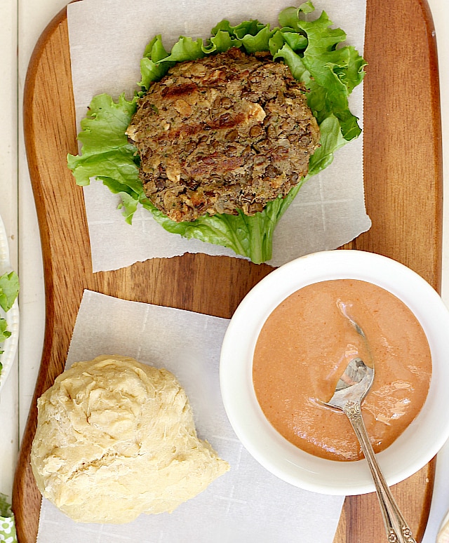 Juicy mouthwatering Veggie Burger made of cooked lentils and zucchini. A flavorful meat-like texture and gluten free patty! #grilled #veggie #burger #lentil #glutenfree #recipe | Delightful Mom Food