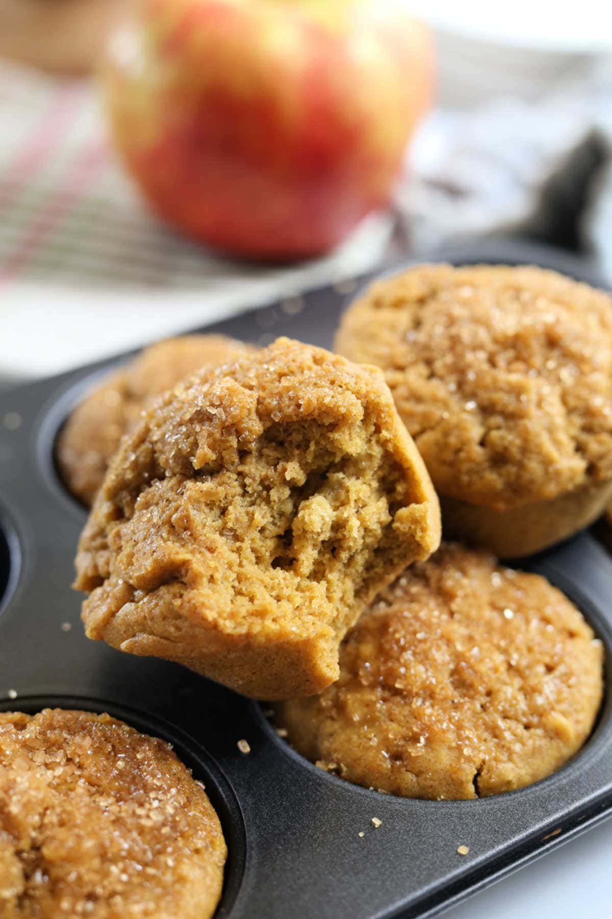 apple muffin recipe made with gluten free flour in a muffin tin