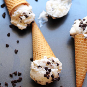 sugar free greek yogurt ice cream with mint flavor and chocolate chips in a cone
