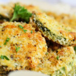 Parmesan zucchini chips sliced breaded and baked.
