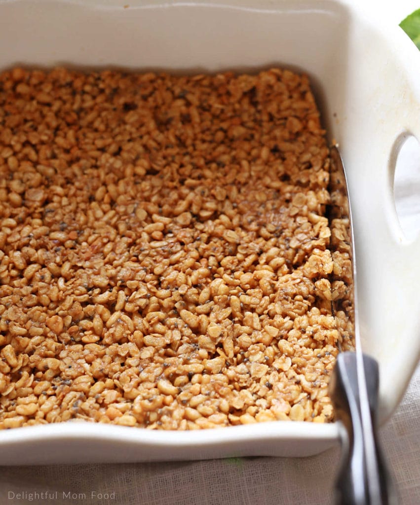 baking pan with peanut butter no bake bars pressed and ready for slicing