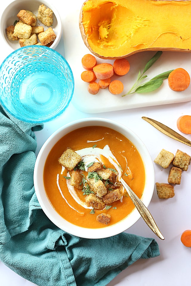 carrot soup with butternut squash and dressed with croutons