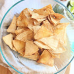 homemade tortilla chips baked in the oven and served in a bowl