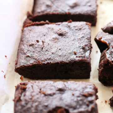 Gluten Free Paleo Brownies on parchment paper
