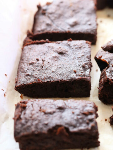 Gluten Free Paleo Brownies on parchment paper