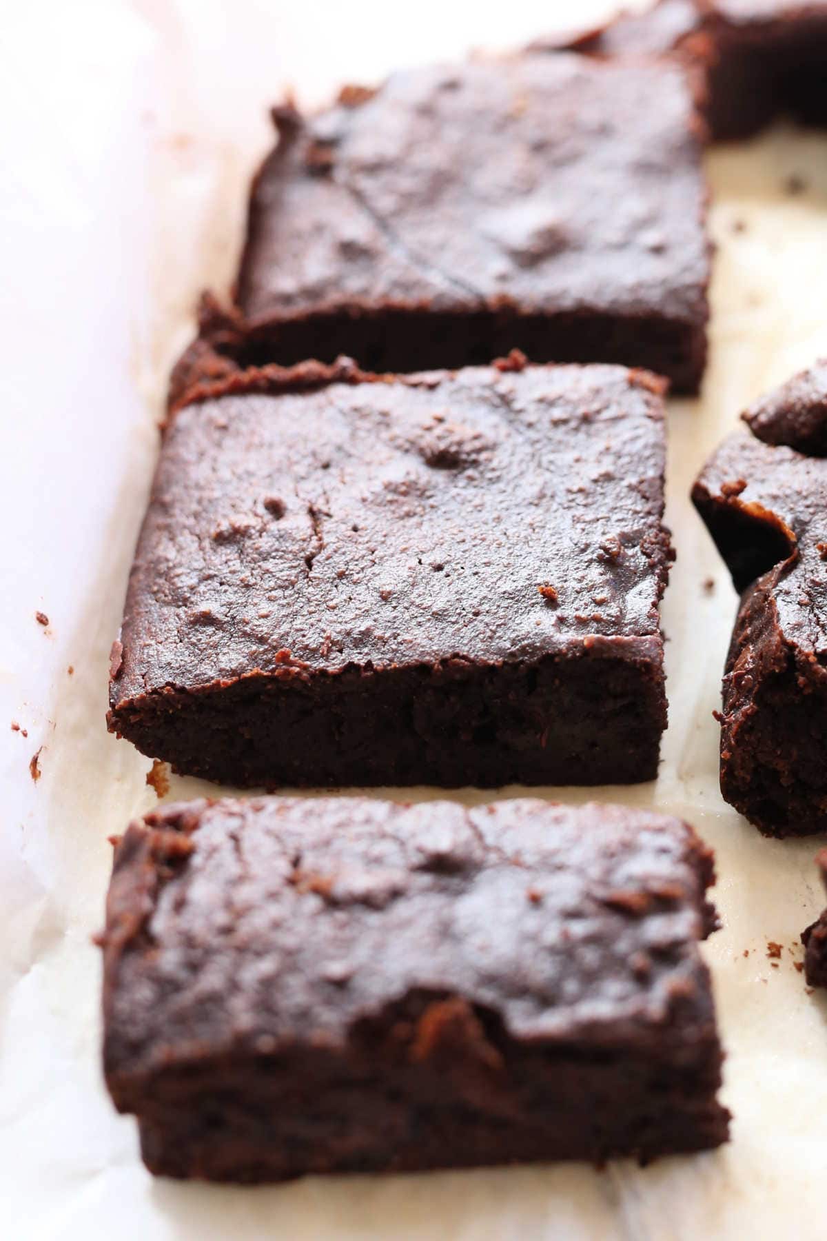 Gluten Free Paleo Brownies on parchment paper.