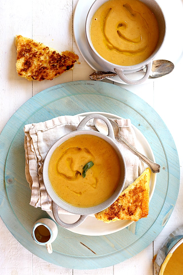 Nourishing roasted butternut squash apple soup has all the flavors of fall simmered together after roasting the squash for about 30 minutes. This vegan soup is made with an optional Paleo, Keto, Whole30 version and is a fall favorite all around!
