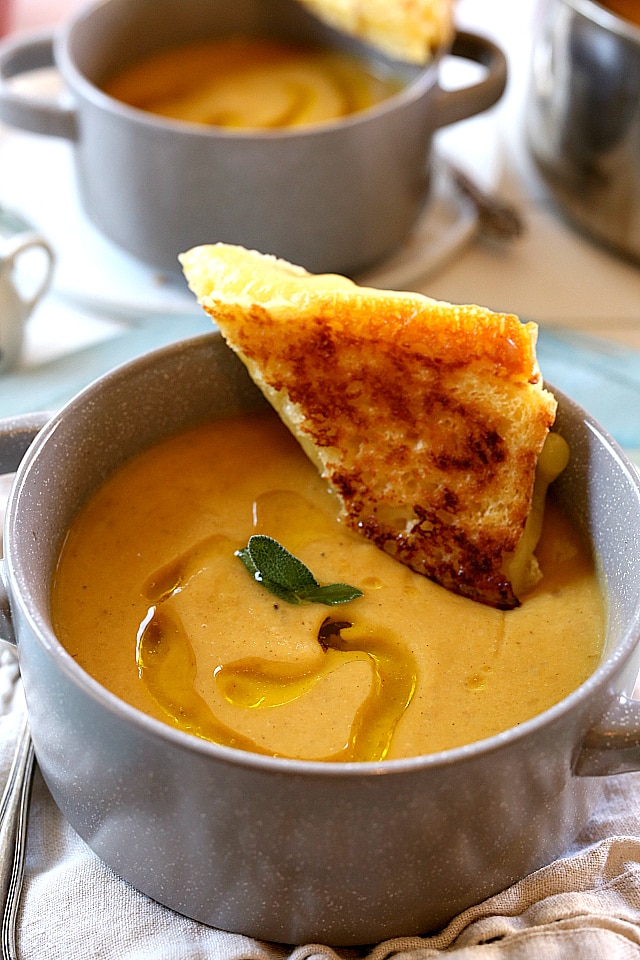 Nourishing roasted butternut squash apple soup has all the flavors of fall simmered together after roasting the squash for about 30 minutes. This vegan soup is made with an optional Paleo, Keto, Whole30 version and is a fall favorite all around!