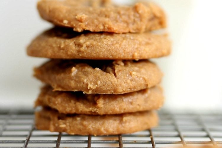 Chewy healthy peanut butter cookies that are secretly vegan and gluten free with a flourless option! So healthy with only 5 simple ingredients and made without butter yet packed with nutritious flavor! You'll even want to eat all the dough before it gets to the oven! #healthy #peanutbutter #cookies #vegan #glutenfree #dessert #treats #sweets #peanutbuttercookies #cookie #recipe | Recipe at Delightful Mom Food