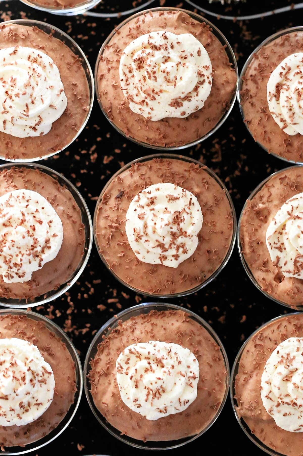 dessert cups filled with kahlua chocolate mousse with cream whipped on top