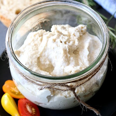 Vegan ricotta cheese is made with cashews or almonds and is perfect for a diary-free lifestyle! This cashew ricotta is incredibly creamy, delicious and perfect as a dip or in vegan lasagna! 