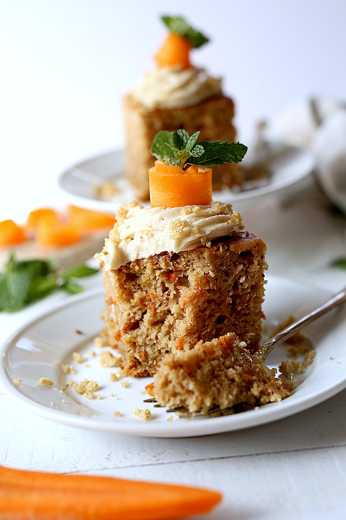 A healthy and easy carrot cake recipe that is so delicious, gluten-free, made with oats and free of refined sugars! It is healthy enough to start your day for breakfast and is topped with buttery refined sugar-free icing made naturally with maple syrup and tapioca flour! #easy #healthy #glutenfree #carrotcake #recipe #oats #refinedsugarfree #icing #Easter #dessert #breakfast | delightfulmomfood.com