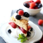 Gluten free strawberry shortcake with fresh strawberries, blueberries, blackberries and raspberries topped on a Greek yogurt honey cream filling! #strawberryshortcake #berry #recipe #glutenfree #healthy #breakfast #pastry | Delightfulmomfood.com
