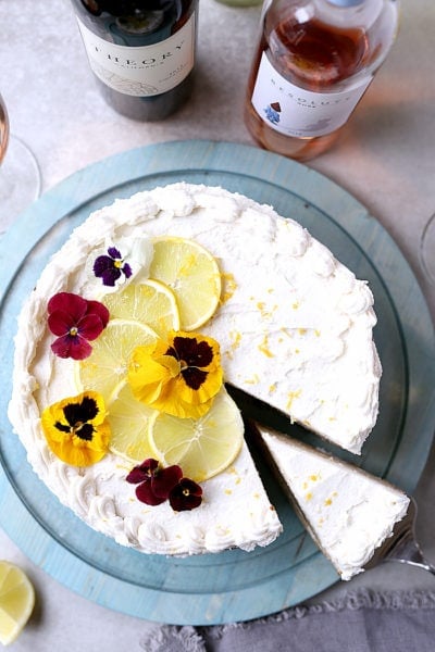 Lemon Yogurt Cake with natural refined sugar free coconut oil icing! An elegant citrus cake to bring to your next celebration. Pairs deliciously with a chilled glass of Rose or Pinto Grigio wine! #sponsored #lemon #cake #glutenfree #recipe #celebration #party | Recipe on delightfulmomfood.com
