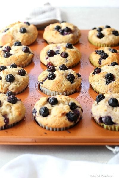 Light and healthy lemon blueberry yogurt muffins packed with Greek yogurt protein and whole food gluten-free ingredients! #glutenfree #muffins #blueberry #lemon #Greekyogurt #yogurt #healthy #easy #breakfast #snack | Recipe at delightfulmomfood.com