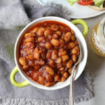 gluten free baked beans in a bowl with a spoon