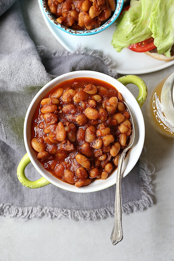 gluten free baked beans in a bowl with a spoon