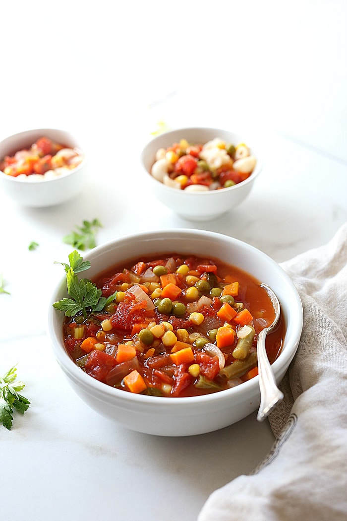 Vegetable soup is healthy and ready in less than 30 minutes! Using organic frozen vegetables in this easy vegetable soup recipe means less dishes and more time! | #vegetable #easy #quick #healthy #recipe #soup #veg #veggie #vegan #vegetarian #glutenfree | Recipe at delightfulmomfood.com