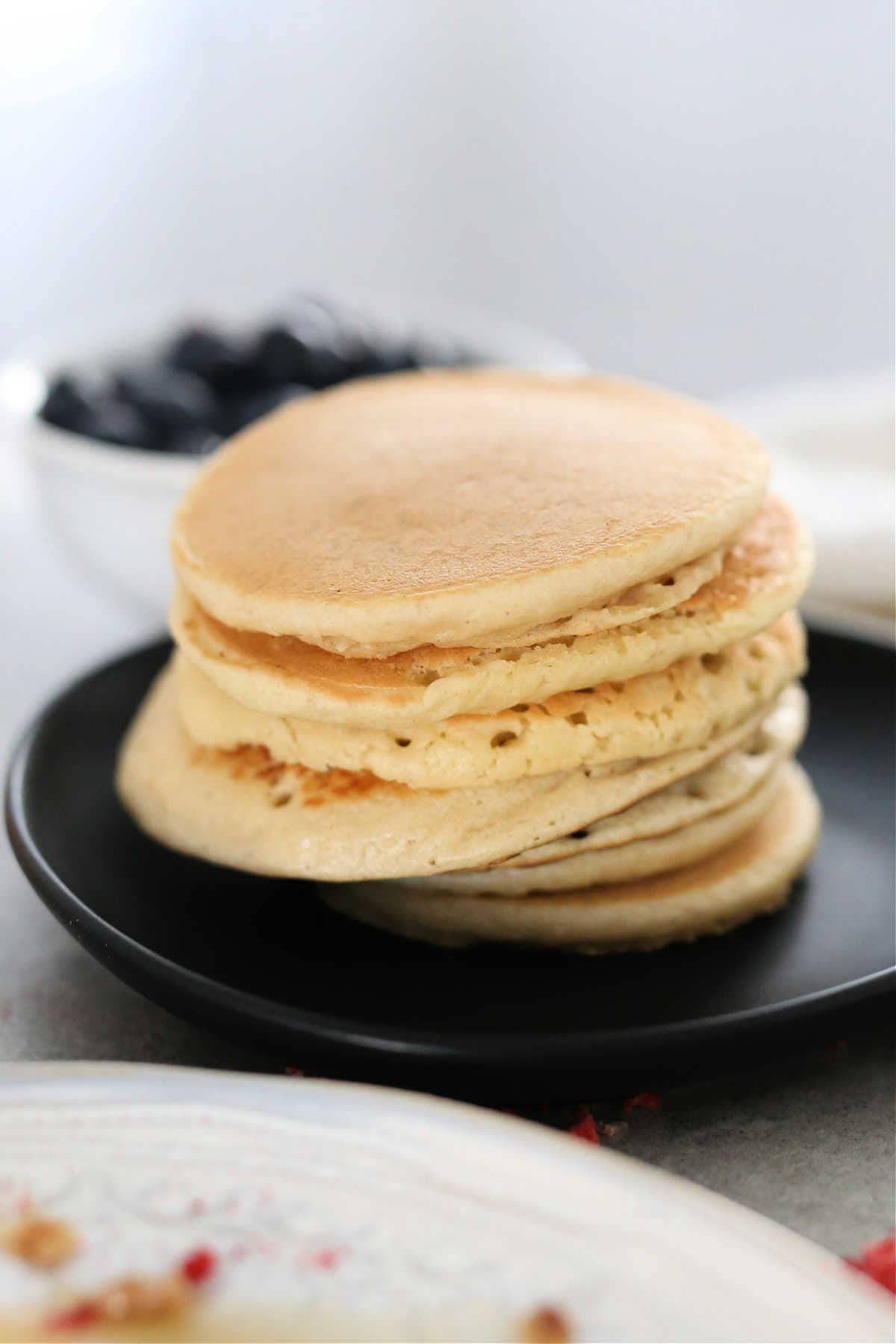 stack of fluffy paleo pancakes