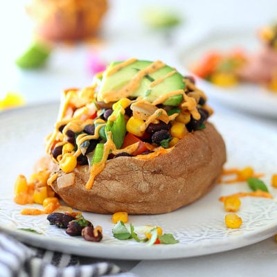 Mexican Stuffed Sweet Potatoes with Spicy Southwest Sauce (Vegan)