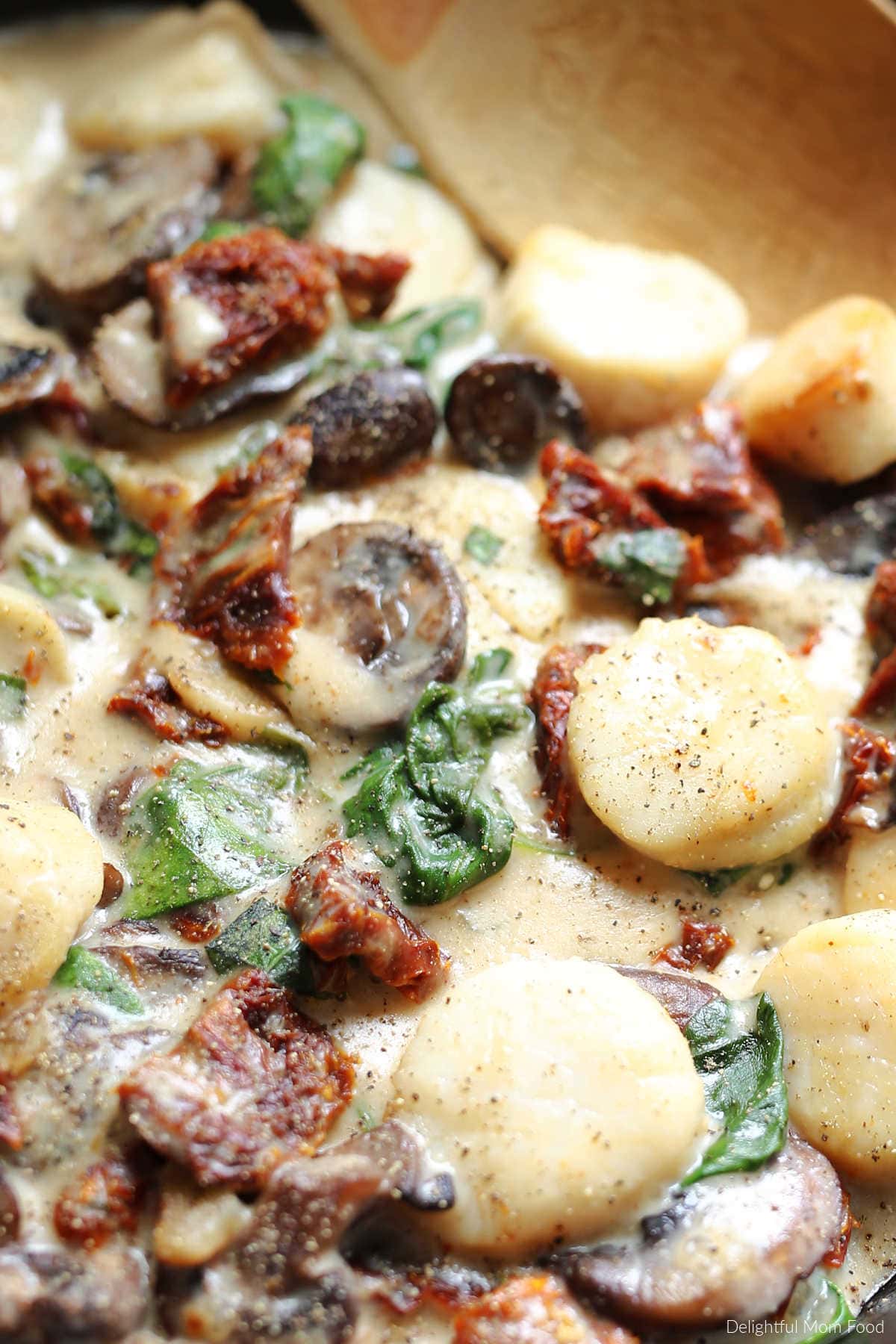 Healthy Tuscan scallops in dairy-free creamy sauce.