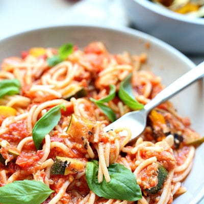 Use up fresh zucchini, yellow squash and juicy plum tomatoes in this mouthwatering healthy spaghetti recipe! This gluten-free summer pasta doesn't compare to other spaghetti! #healthy #summer #pasta #spaghetti #glutenfree #recipe #zucchini #squash #main #dinner | recipe at Delightful Mom Food