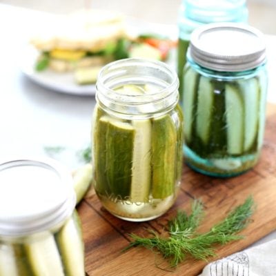Crispy crunchy and super simple kosher dill pickles recipe! Step-by-step ways how to make dill pickles, because these pickles are so much crunchier and flavorful than store-bought that you will want to make them on repeat! #kosher #dill #pickles #howtomake #dillpickles #pickling #recipe #canning #canpreserving #sponsored #BallProudlyHomemade | Recipe at Delightful Mom Food