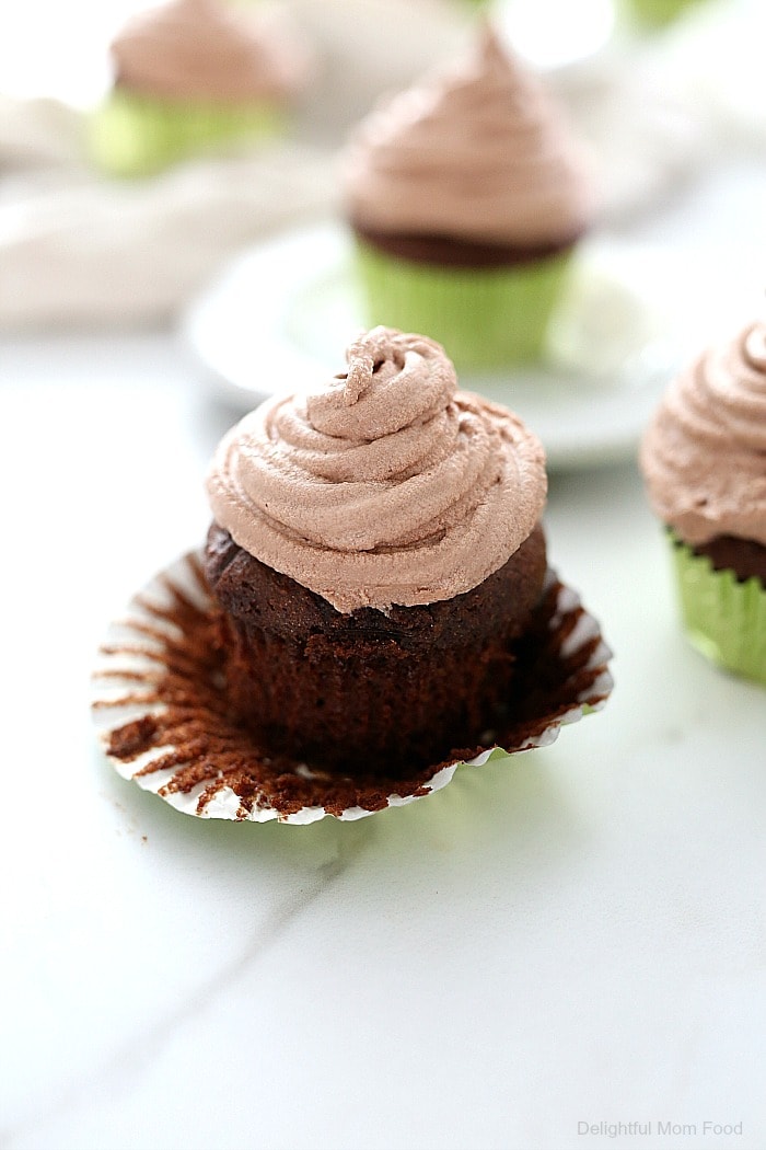 Gluten free chocolate cupcakes that are spongy and moist with creamy dairy free chocolate icing! These easy gluten free and dairy free chocolate cupcakes are a must for all celebrations and are great for anyone with dairy and wheat allergies. #glutenfree #dairyfree #chocolatecupcakes #chocolate #dessert #cupcakes #recipe #baking #sweets | Delightful Mom Food