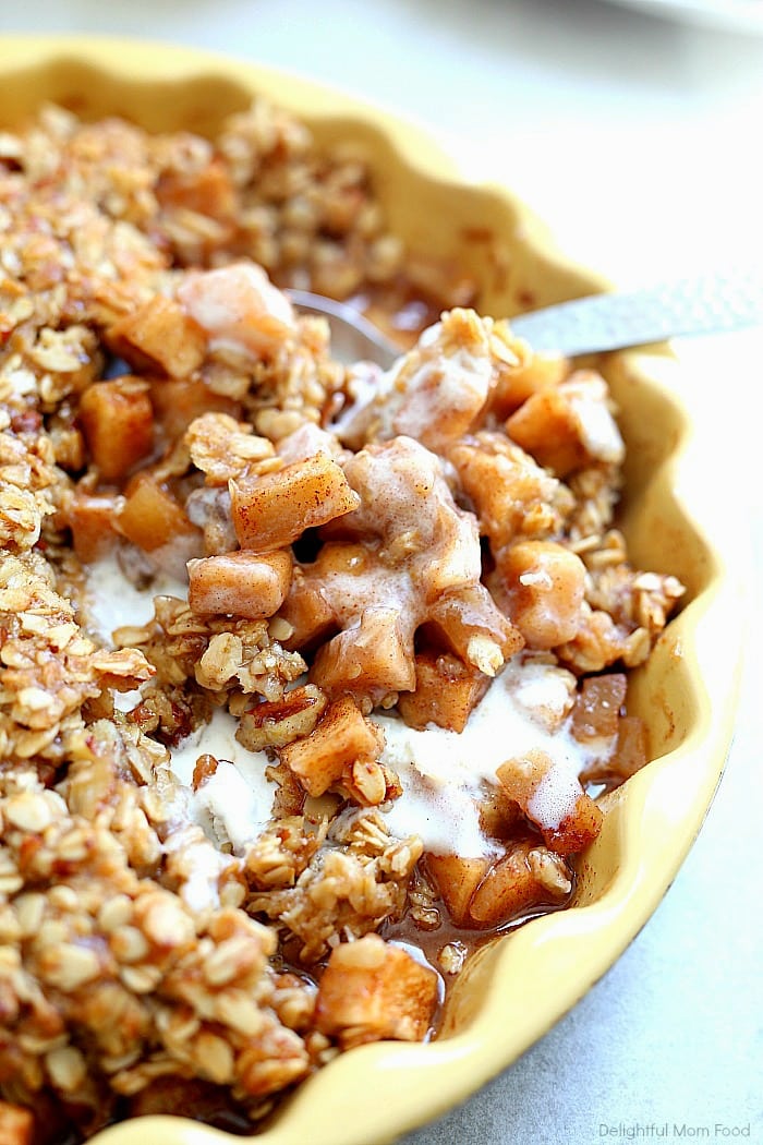 Cozy up this Fall with this vegan and gluten-free apple crisp recipe made with healthier sugars! It is a simple apple dessert prepared in 10 minutes, caters to most food allergies, and always wins the crowd over! #glutenfree #vegan #applecrisp #holiday #apples #recipe #dessert #sweets | Recipe at Delightful Mom Food