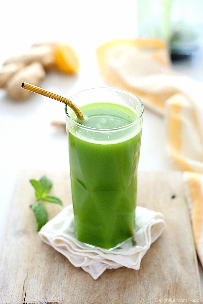 Fresh detox green juice made of cucumbers, celery, ginger, romaine lettuce, and lemon to promote body cleanse and assist in weight loss! Learn how to make it in a blender and drink this magical green drink every morning!  #detox #greenjuice #drink #greendrink #drink #beverage #juice #healthy #cleansing #weightloss #wellness | Recipe at Delightful Mom Food