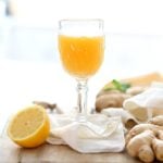 Drinking this concentrated fresh + cleansing wellness shot made of metabolism boosting cayenne pepper, lemon, ginger and apple improves digestion, skin, fights colds and flu and aids to reduce inflammation! It is a quick and easy immunity blast to jumpstart the body for optimal health! #wellness #detox #lemon #wellnessshot #drink #beverage #cleanse #bodycleanse #wellnessshot #immunityshot #ginger #shot #recipe #healthy #healing | Recipe at Delightful Mom Food