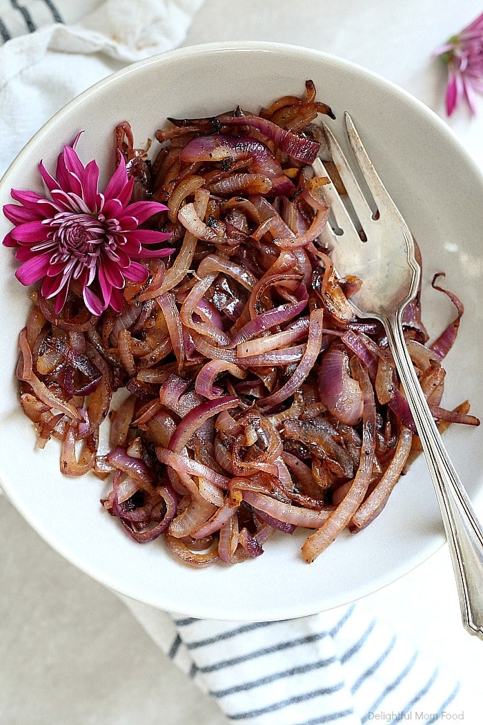 When you need a quick side on the table to revamp any dish, caramelized onions are just the ticket! Caramelizing onions decreases sharp aromas of an onion while adding depth and flavor. It is an essential ingredient that brings out character in most savory dishes! #caramelizedonions #onions #recipe #easy #healthy #glutenfree #sauteedonions #sides #vegan #vegetarian | Recipe at Delightful Mom Food