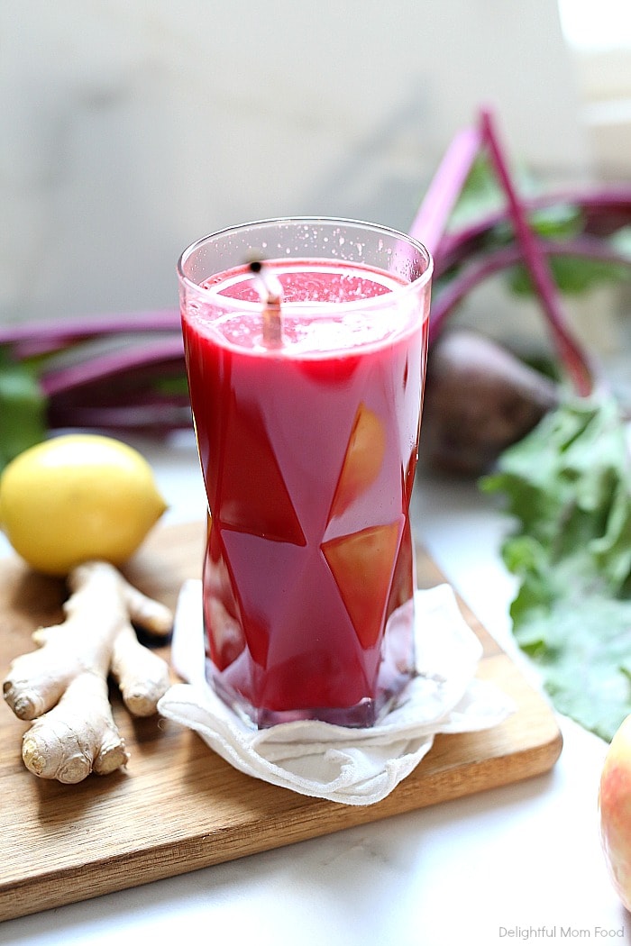 The BEST detox beet juice recipe! This healthy and easy homemade beet juice is made quickly with ingredients that detox for a body cleanse, to help with weight loss, improve skin, lower blood pressure and increase energy! #detox #beetjuice #detoxdrinks #blender #juicer #beets #recipe #bodycleanse #weightloss #recipe #healthy #easy #quick | Recipe at Delightful Mom Food