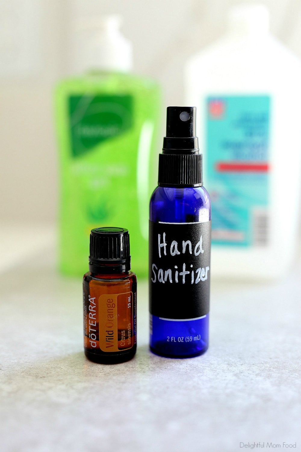 Easily make hand sanitizer at home with 3 simple ingredients! This homemade hand sanitizer recipe uses alcohol, aloe, and essential oils with the perfect ratio to sanitize without extra chemicals and fussy ingredients. Perfect when need some in a jiffy! #diy #homemade #recipe #handsanitzer #howtomake #recipeforhandsanitizer #handsanitizerspray | Recipe at Delightful Mom Food