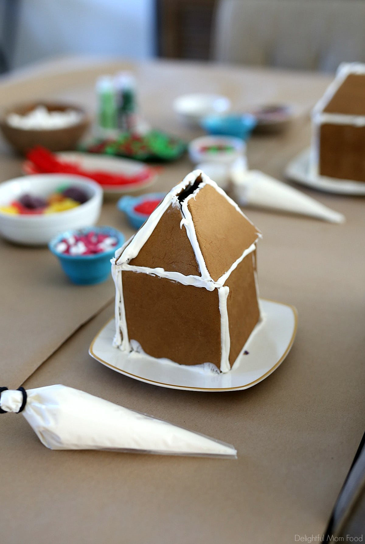 putting together a gingerbread house