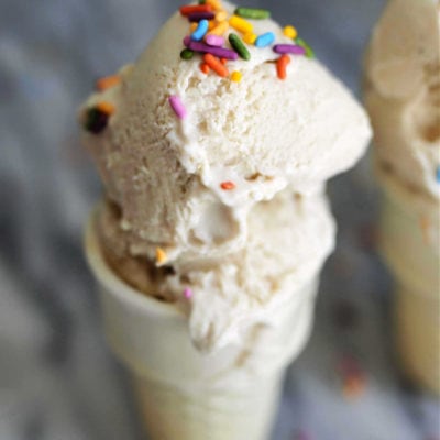 smooth creamy cauliflower ice cream in a cone with sprinkles on top