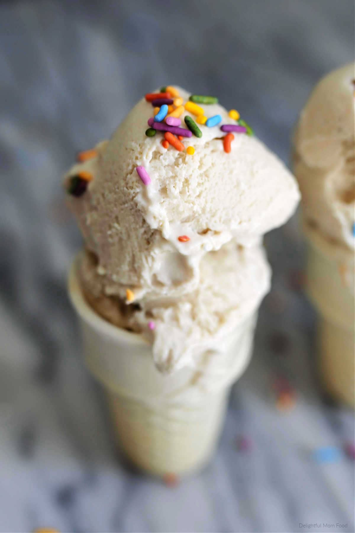 smooth creamy cauliflower ice cream in a cone with sprinkles on top