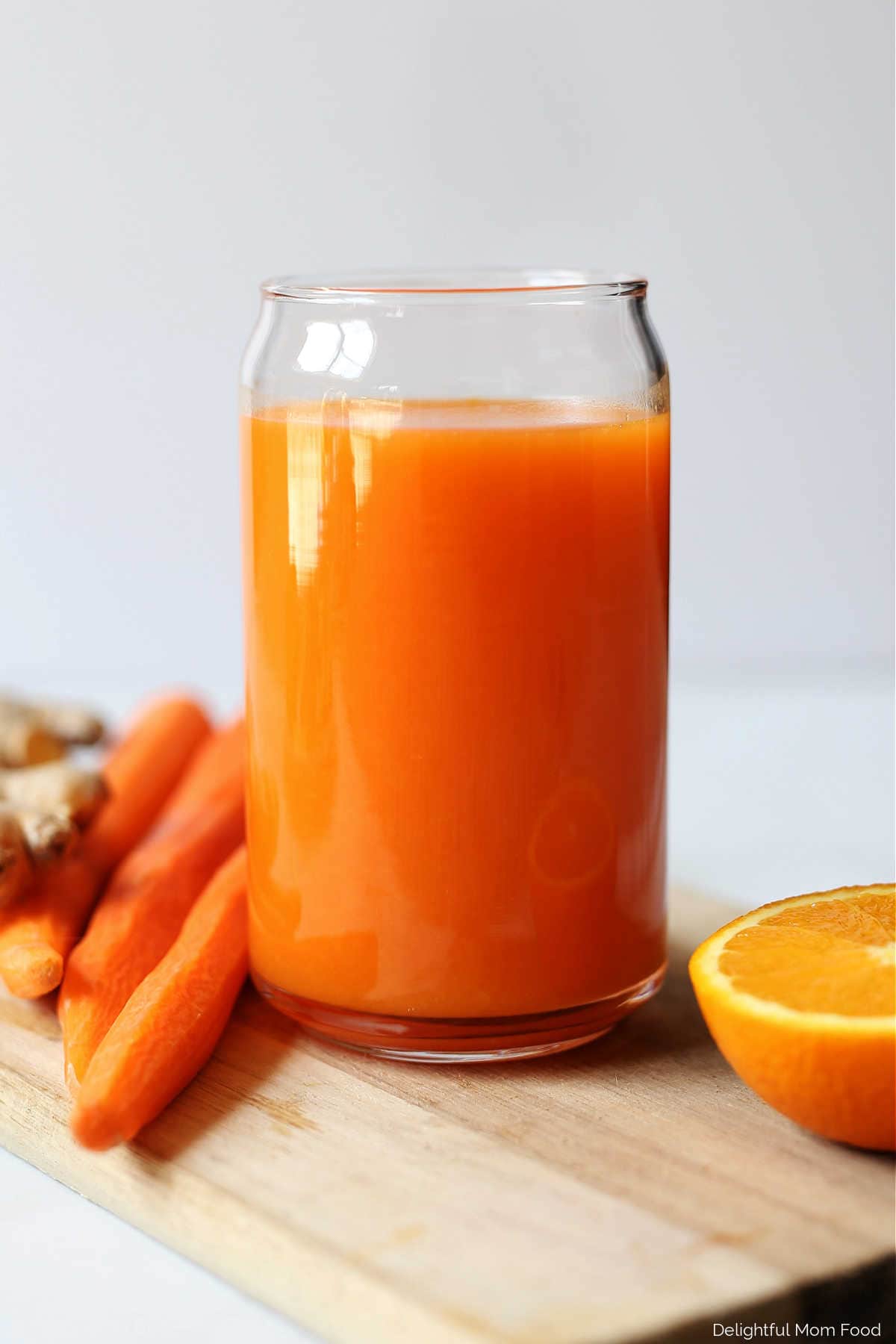 Glass of cinnamon ginger carrot juice.