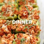 healthy ground turkey stuffed peppers in a casserole dish