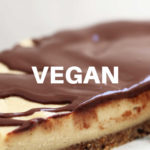 close up of vegan ganache spread vegan cheesecake