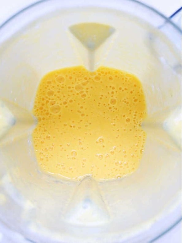Pineapple orange juice blended until smooth in the blender.