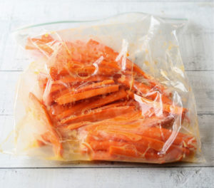 carrots in a bag with egg for garlic parmesan carrot fries