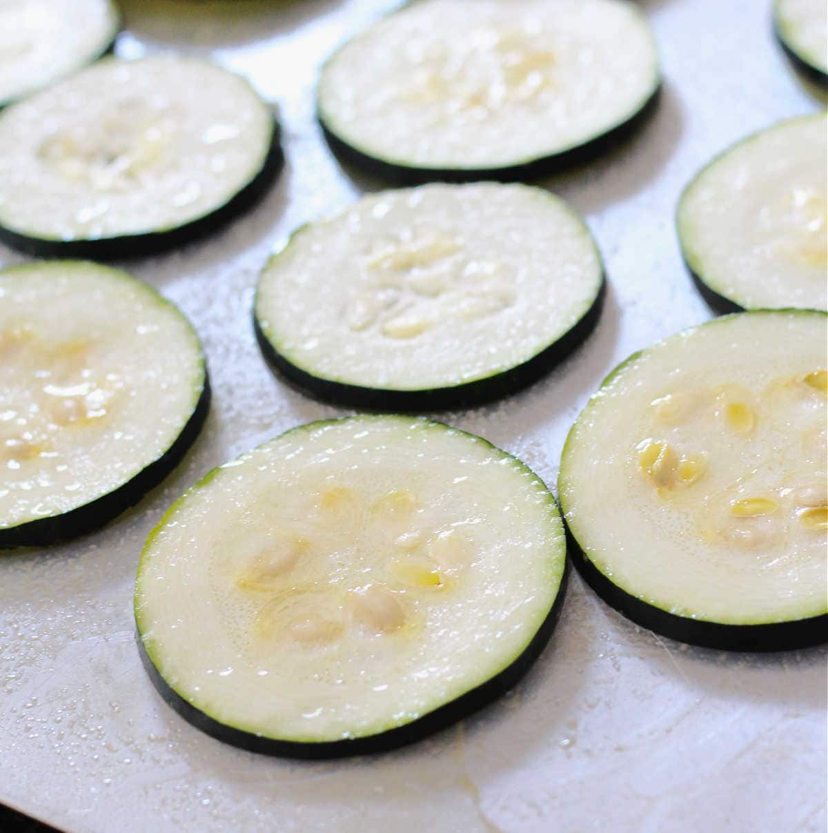 zucchini squash resting with salt drizzle to remove excess water