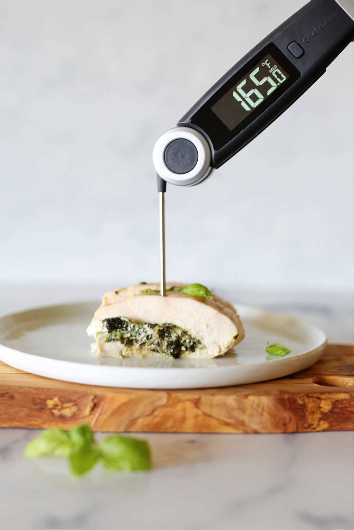 meat thermometer in a stuffed chicken breast